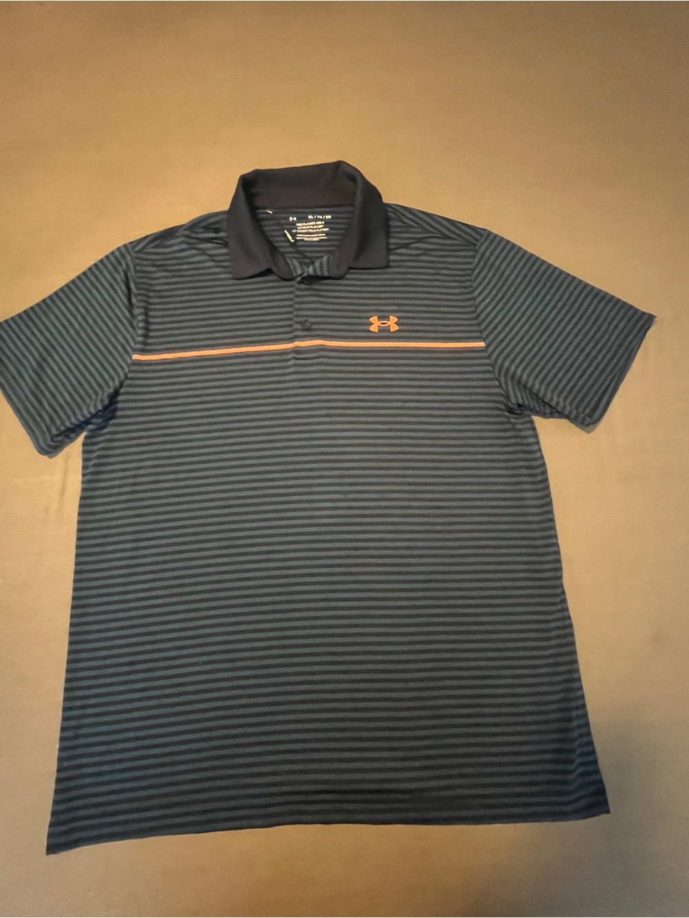 Under Armour Men’s Blue Striped Polo with Orange Accent
